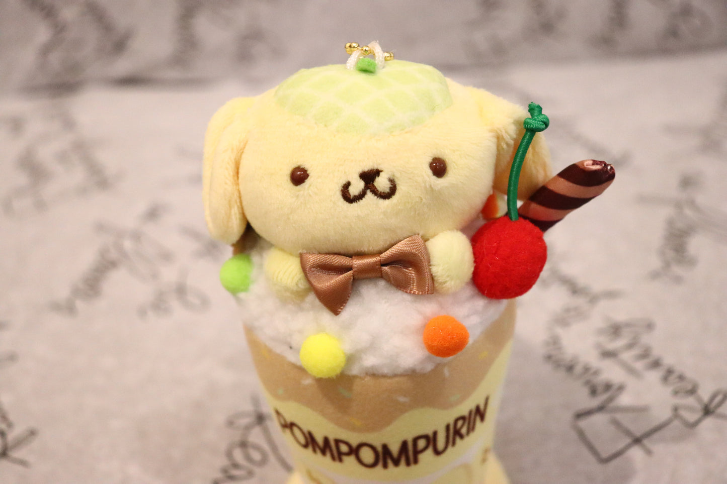 Sanrio keychain features Pompompurin-kawaii-sweet-bubble tea